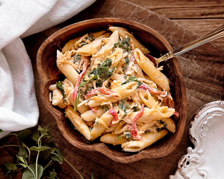 Pasta with creamy sauce and fresh herbs